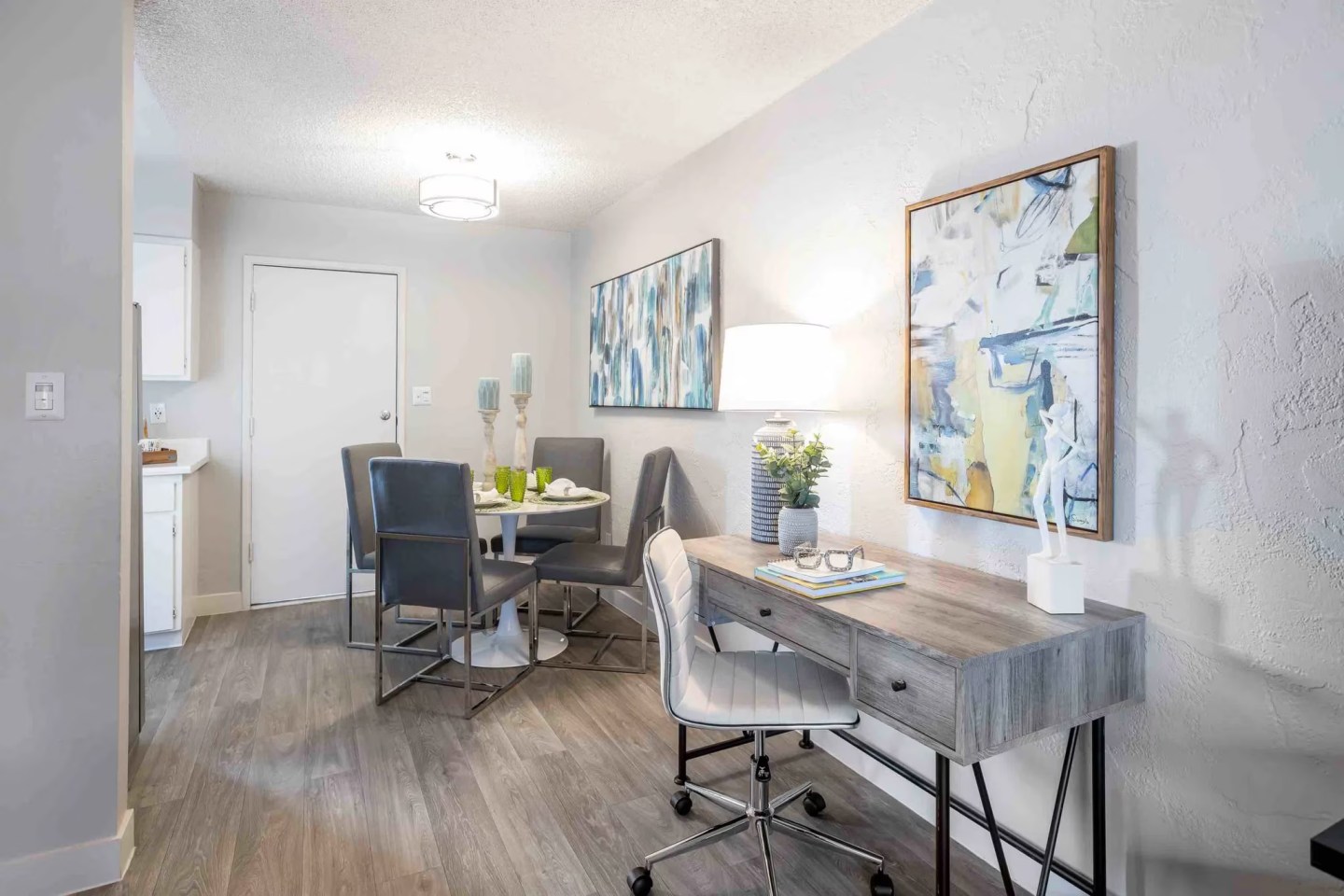 Furnished dining area shown — representative home at Villas de Azul.
