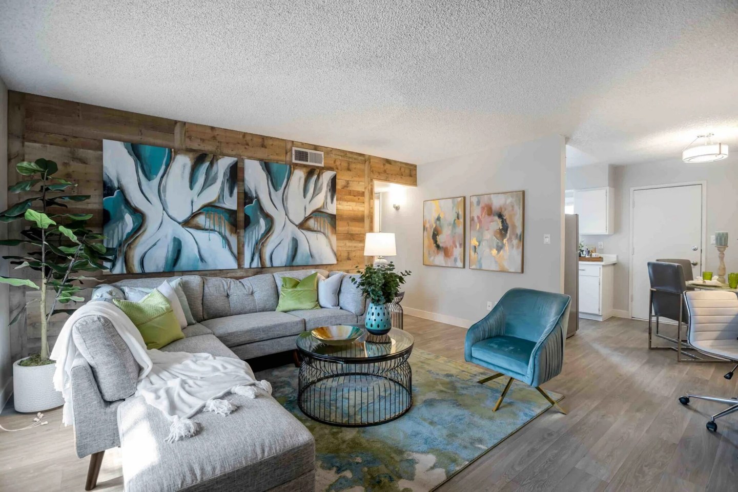 Furnished apartment living area shown — representative home at Villas de Azul.